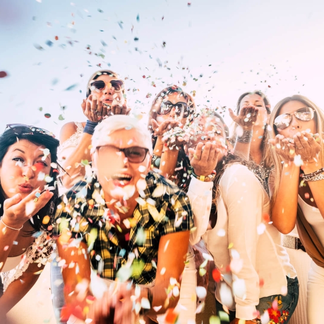 People and family celebrating at The Singer Oceanfront Resort