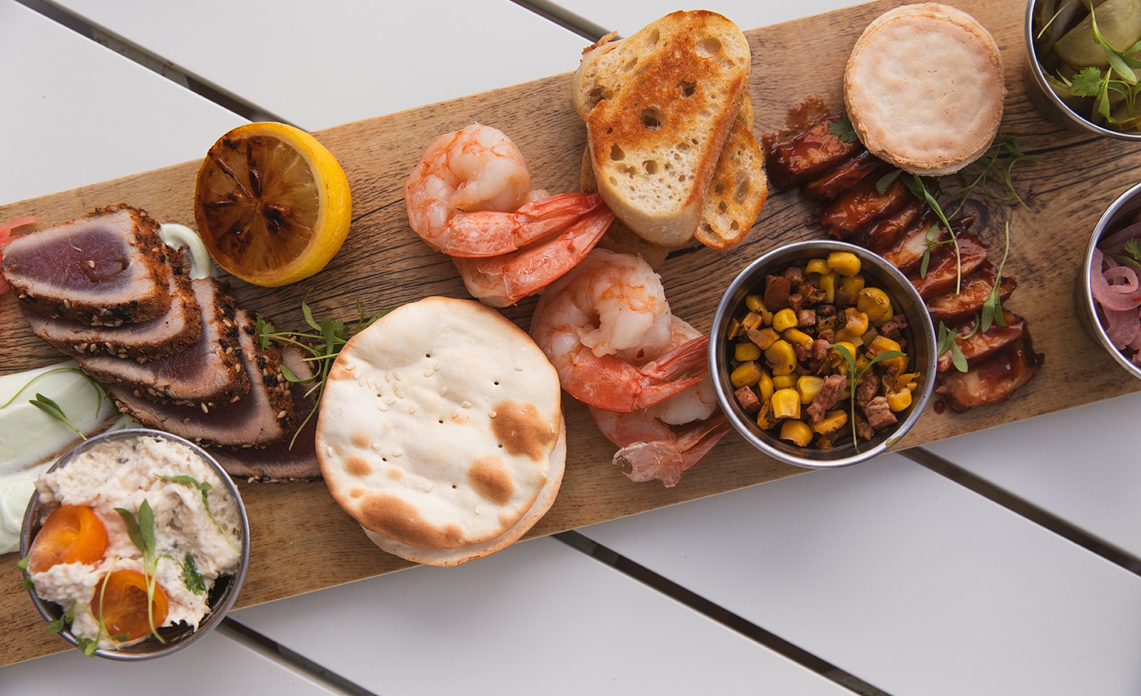 seafood board with fish dip and shrimp